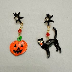 Lunch at the Ritz pierced Halloween earrings. A black cat and a jack-o’-lantern.
